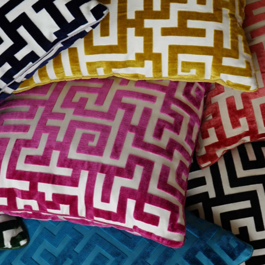 Apollon cut velvet fabric on cushions in a greek key design - blue, pink, carnelian, black, yellow