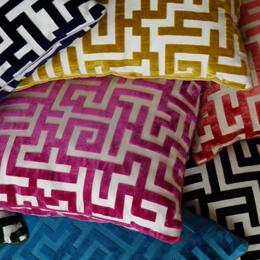 Apollon cut velvet fabric on cushions in a greek key design - blue, pink, carnelian, black, yellow