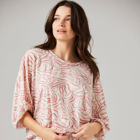 Floral patterned demi top in merino wool and pink floral pattern