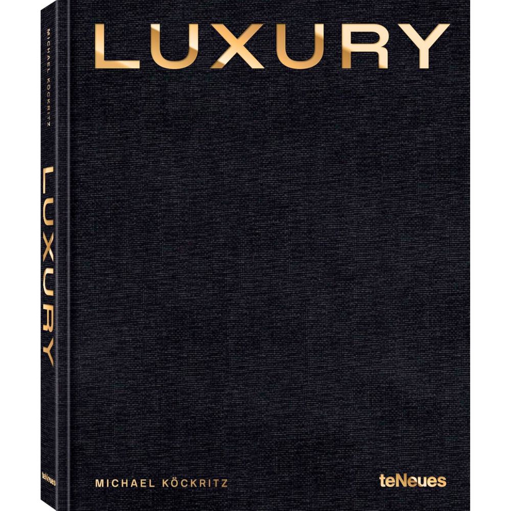 Black book with gold writing entitled Luxury by Michael Köckritz 