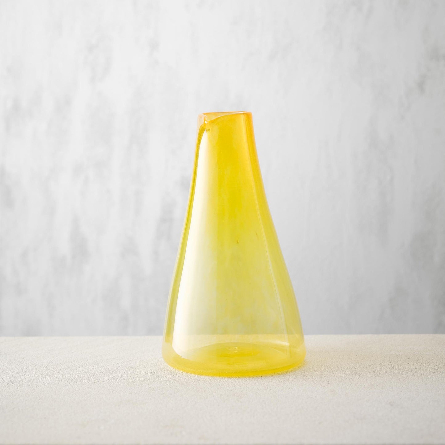 Yellow hand blown glass carafe