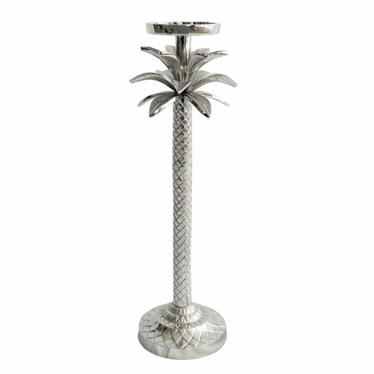 Silver candle stick with palm fronds at the top
