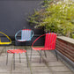 Woven outdoor chairs in red and blue