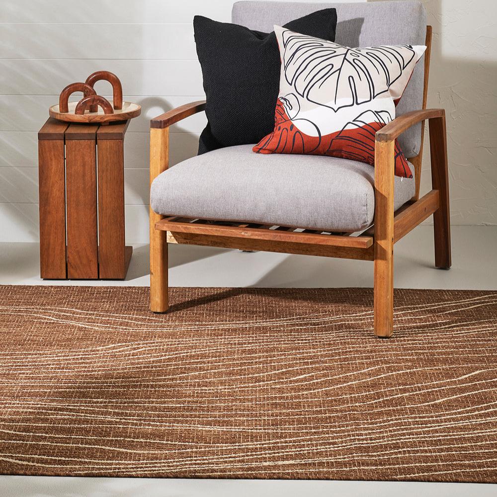 Rivers Teak rug with a warm rustic colour and white lines mimicking a river