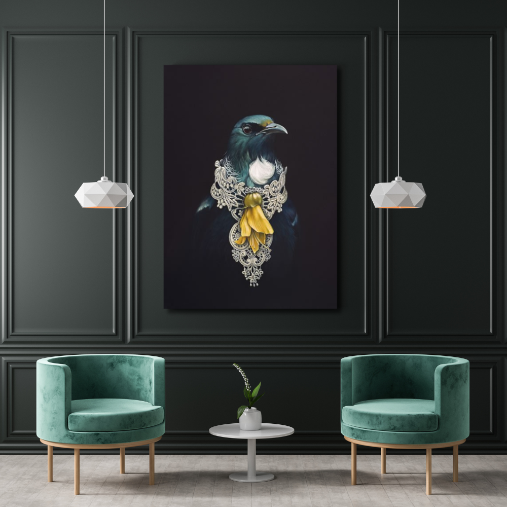 Canvas art print "she of the kowhai" by Jane Crisp hung on a dark green panelled wall with two moder round green velvet chairs in front. 