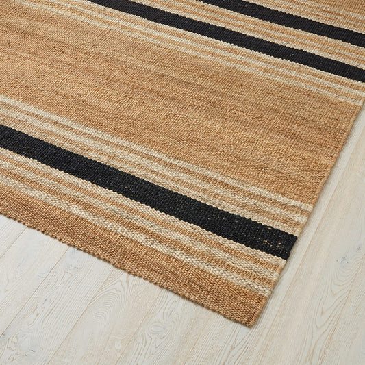 100% Jute Rug, the Syracuse is a golden wheat colour with a black and white stripe
