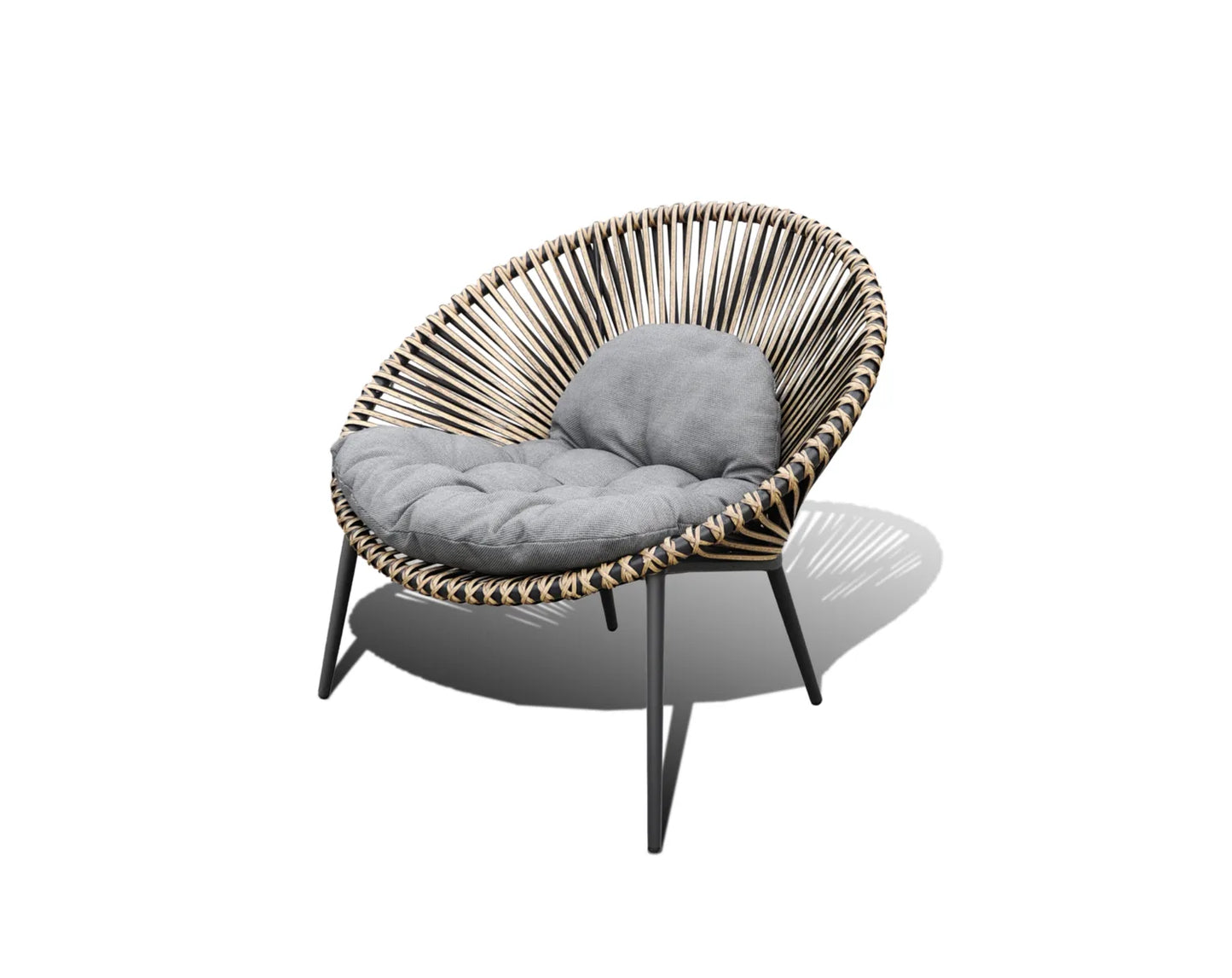 Round wicker chair with a grey cushion on it
