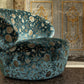 Luxurious chair covered in blue Tomorrowland fabric from Carlucci