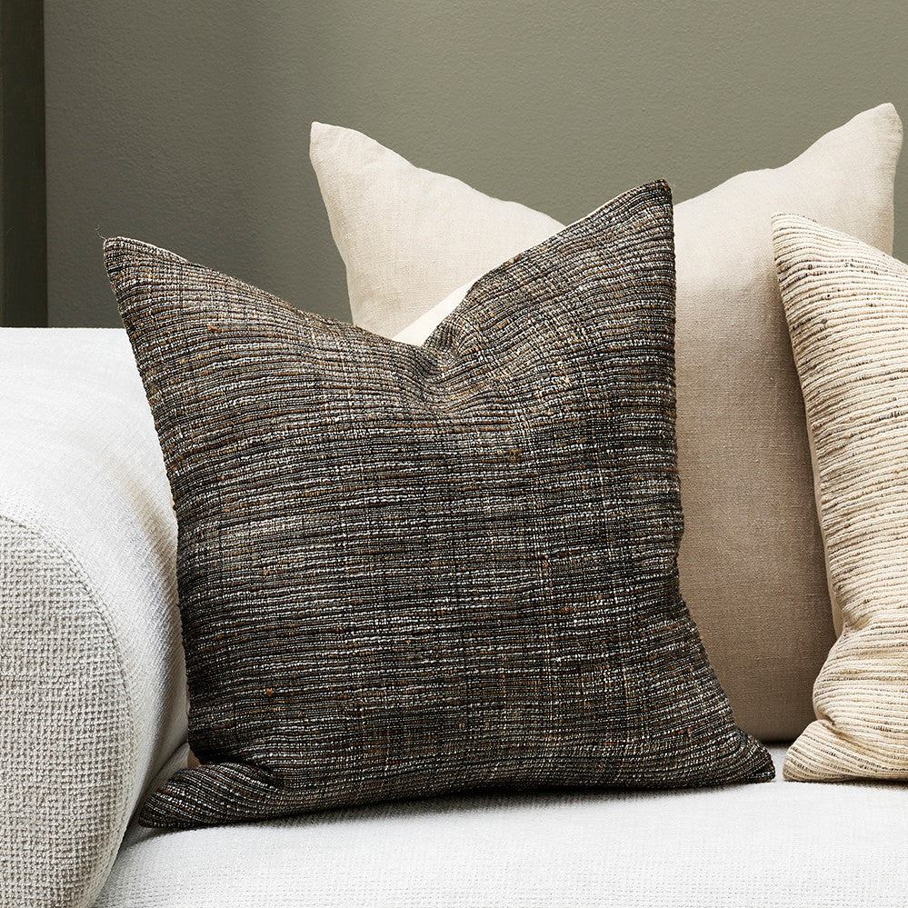 Dark textured square cushion